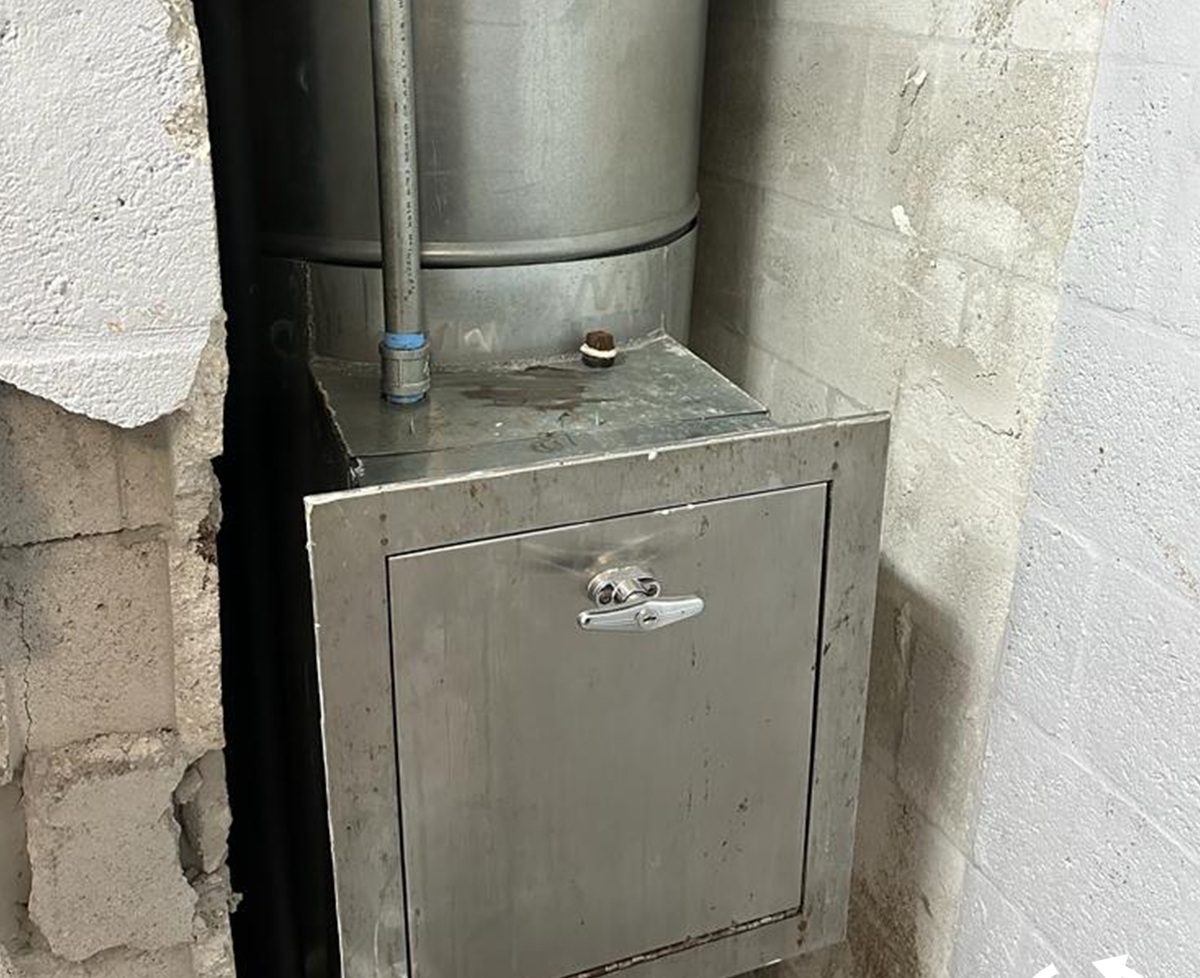 A clean new chute section in the same wall opening